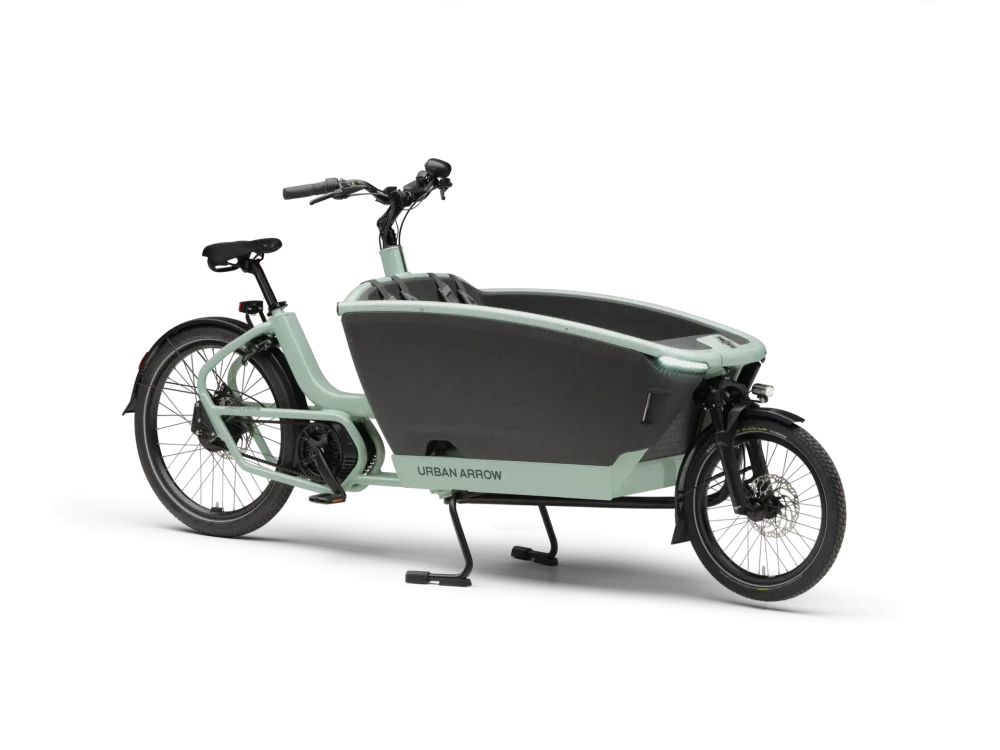 Urban Arrow FamilyNext Pro carrying a family in green