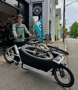 Rider with an Urban Arrow outside the shop